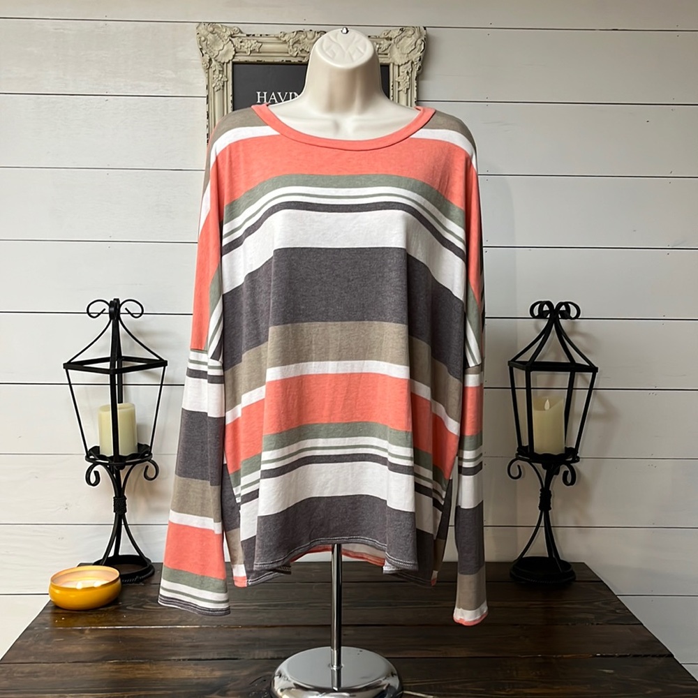 Brand new no tags! Women’s size 1XL striped long sleeve shirt.